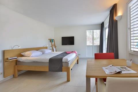 Hotelkamer in Time to Smile Chogogo Dive & Beach Resort in Jan Thiel, Curacao foto 3