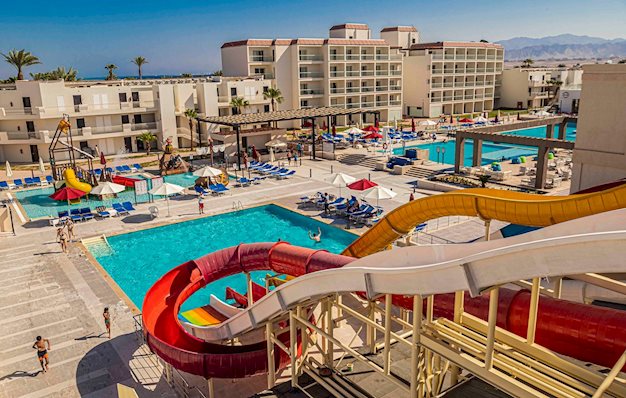 Zwembad met glijbanen van Amarina Abu Soma Resort Soma Bay, Egypte foto 2