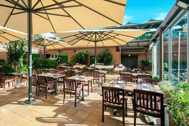 Restaurant in het Rosamar Garden Resort in Lloret De Mar, Spanje foto 3