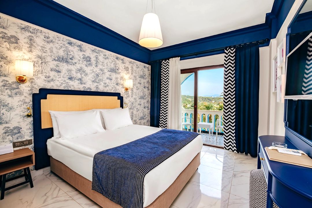 Een foto van een slaapkamer bij Utopia Resort 